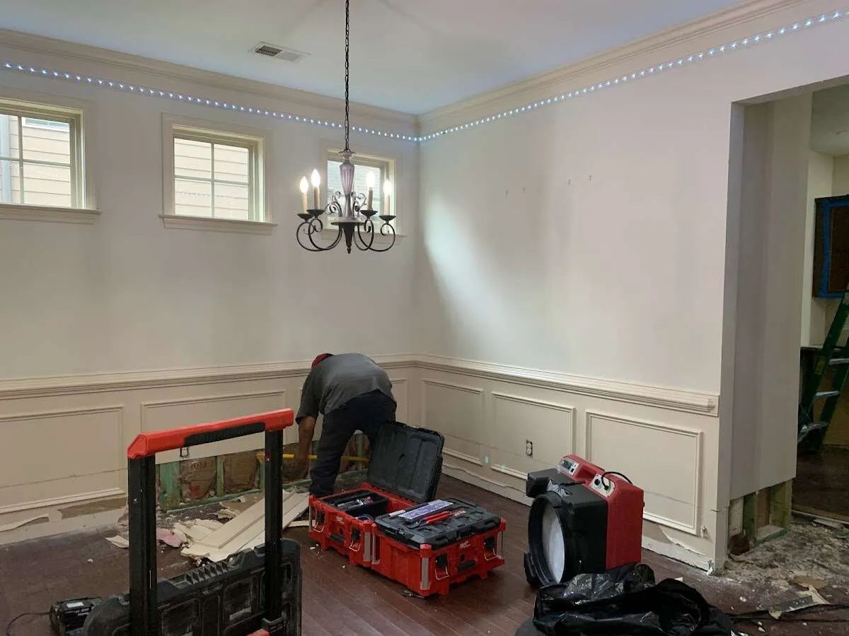 Restoration technician with professional equipment in Wilmington